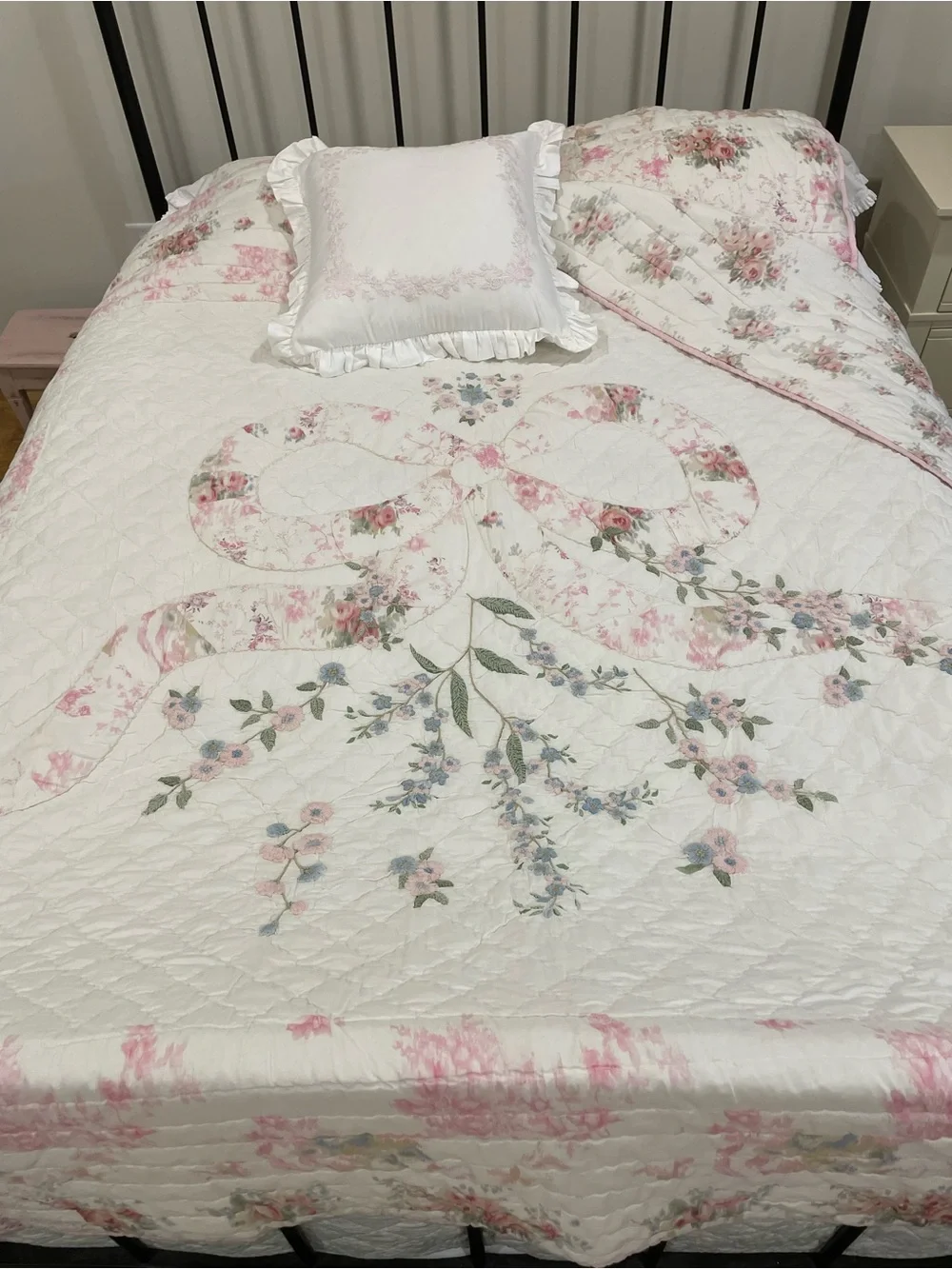 White Quilted Floral Bedspread with Pink and Green Accents